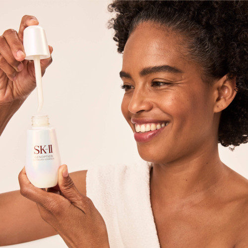 GenOptics Ultraura Essence is SK II's best-selling brightening serum to visibly reduce dullness and target sun spots slide2